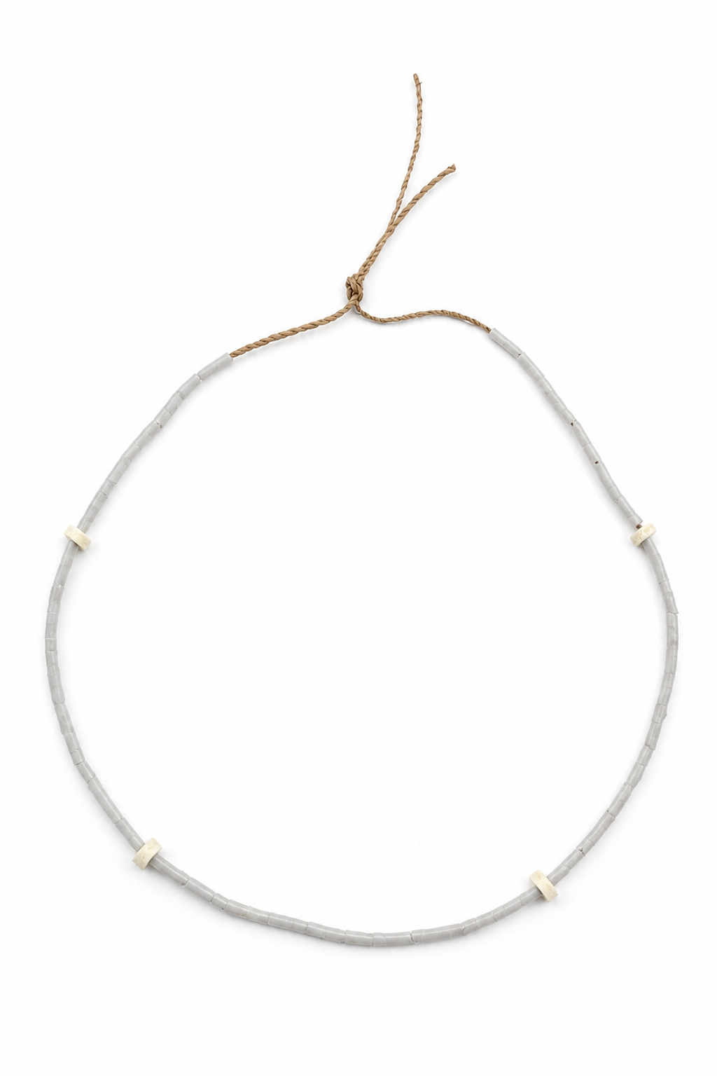 Horn shell and shark bone necklace